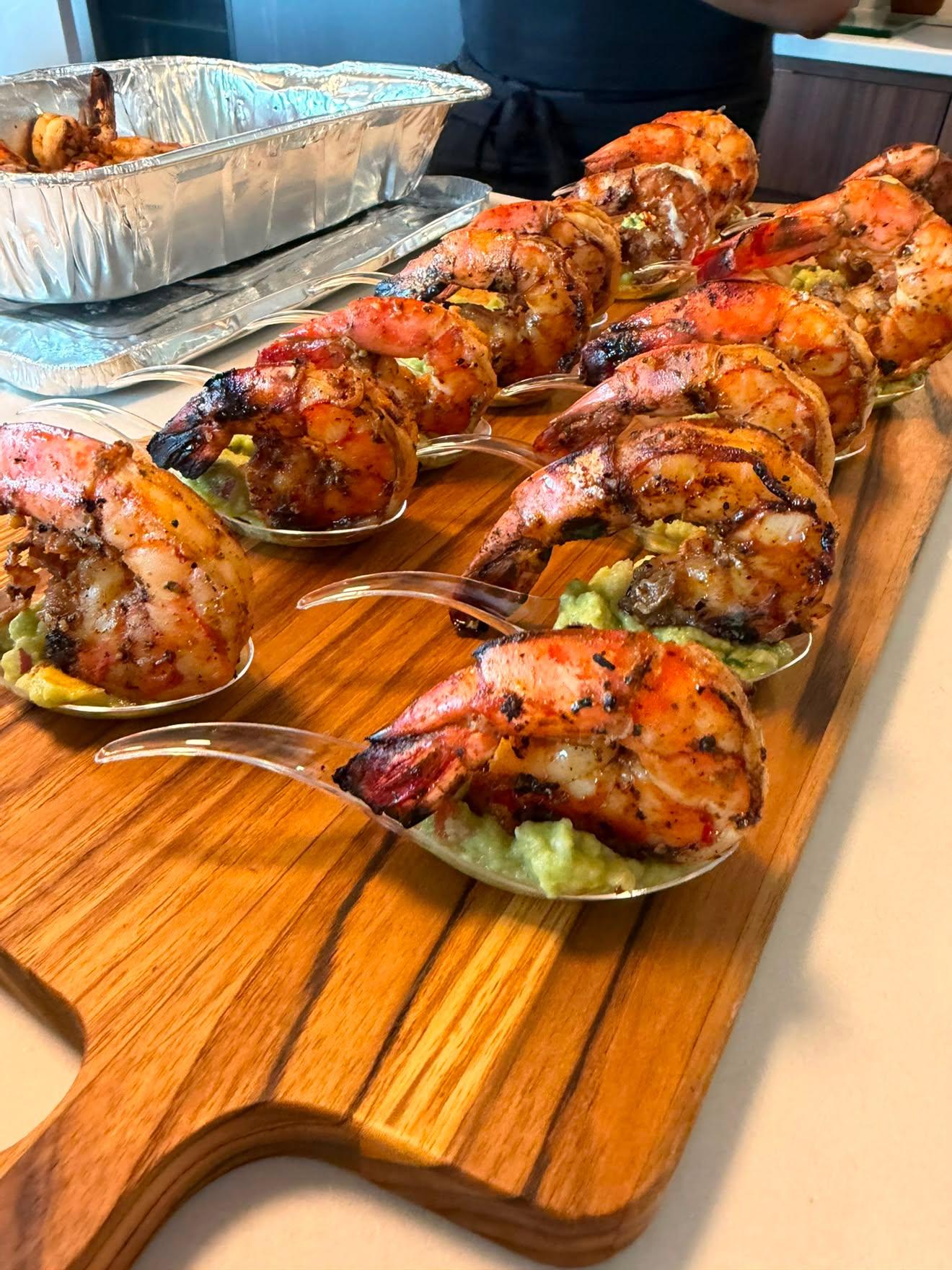 Grilled shrimp on avocado spoons